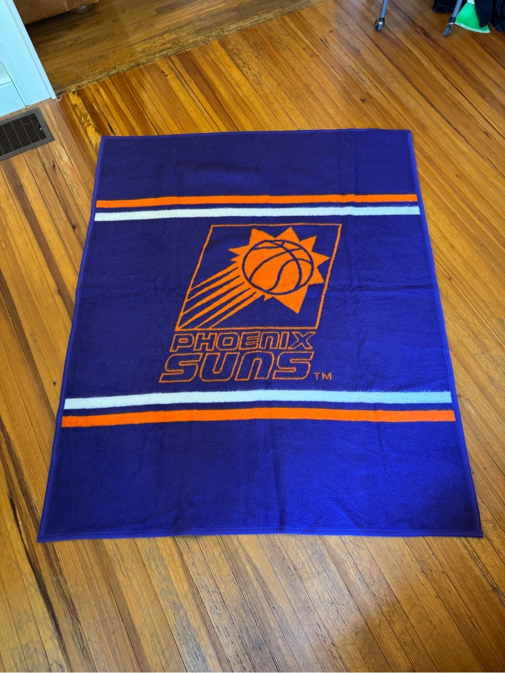 Phoenix Suns Plush Throw Blanket in Purple and Orange Biederlack